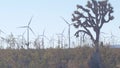 Windmills on wind farm, wind mill energy generators. Desert windfarm, USA. Royalty Free Stock Photo