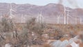 Windmills on wind farm, wind mill energy generators. Desert windfarm, USA. Royalty Free Stock Photo