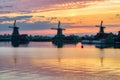 Windmills in Zaanse Schans, Holland, on sunrise Royalty Free Stock Photo