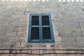 Window with aged wooden vintage shutters. Lija. Malta Royalty Free Stock Photo