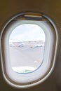 The window of the airplane. A view of porthole window on board an airbus for your travel concept or passenger air transportation Royalty Free Stock Photo