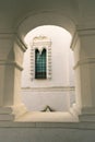 Window and arch made of white stone Royalty Free Stock Photo