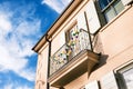 Window Balcony with Mardi Gras Decorations