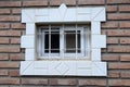 Window with bars on a brick wall Royalty Free Stock Photo