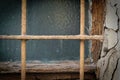 Window with window bars on a rundown house Royalty Free Stock Photo