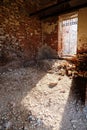 Window with beaming sunlight in a red brick wall. Ruined wall of an antique Russian church Royalty Free Stock Photo