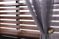 Window with beautiful curtain and blinds Royalty Free Stock Photo