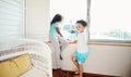 Window, bedroom and portrait of children in home look outdoors for relaxing, playing and quality time. Family, siblings