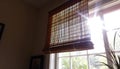 Window blinds with sunlight, depicting interior light and shadow patterns in home spaces Generative AI Royalty Free Stock Photo