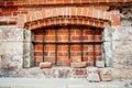 Window blocked with grid and bricks Royalty Free Stock Photo