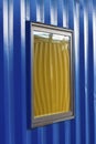 Window in Blue Container Building Royalty Free Stock Photo
