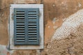 Window with a blue shutter Royalty Free Stock Photo