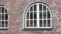 Window in brick wall, snowy winter day