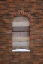 A window on a brick wall in an unfinished house Royalty Free Stock Photo