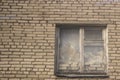 The window is bricked from the inside. Abandoned house. White brick wall with a window. Royalty Free Stock Photo