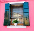 Window of a bright pink house