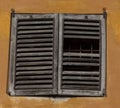 Window with broken shutter Royalty Free Stock Photo