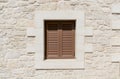 Window with brown shutter