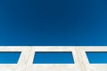 Window of a building shell with blue sky