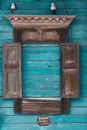 Window carved architraves of an old traditional wooden house in the Russian village Royalty Free Stock Photo