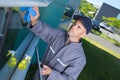 Window cleaning employee with work tools Royalty Free Stock Photo