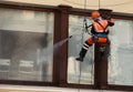 Window cleaning by industrial climber