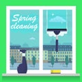 Window cleaning. Spring cleaning concept. Glass scraper glides over the glass, making it clean. Spray glass cleaner and a sponge. Royalty Free Stock Photo