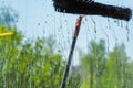 Window cleaning using telescopic water brush and wash system Royalty Free Stock Photo