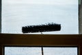 Window cleaning using telescopic water brush and wash system Royalty Free Stock Photo