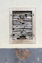 Window closed with stones