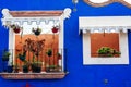 Window on a colorful house in the colonial town of Merida, Mexico - sep, 2019 Royalty Free Stock Photo