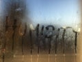 Window condensation, word humidity Royalty Free Stock Photo