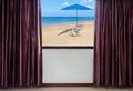 Window with curtains and blinds looking out the window frame meet seaside view Royalty Free Stock Photo