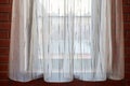 Window curtains in loft apartments