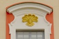 Window decoration, sculpted face with hat with feathers