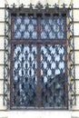 Window with decorative metal grid Royalty Free Stock Photo