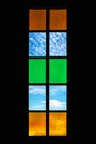 Window design distributed glass combining amber, green and blue Royalty Free Stock Photo