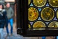 Window detail with colored circles with lead glass