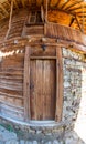 Window and door - an element of the stone-wooden architecture of the mountain village of Zheravna in Bulgaria Royalty Free Stock Photo