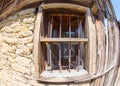 Window - an element of the stone-wooden architecture of the mountain village of Zheravna in Bulgaria Royalty Free Stock Photo