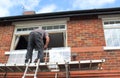 Window Fitter Installing New Glass Royalty Free Stock Photo