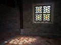 A Window In A Chinese Garden With Flower Designs