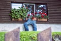 Window with flower and funny jeans, Kordiky, Kremnica hills, Slovakia