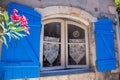 Window with flowers in old house, Provence, France Royalty Free Stock Photo