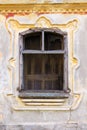 Window Frame With Vintage Decor On a Ornate, Rustic, Worn, Aged Wall