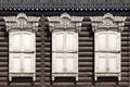 Window-frames and shutters of a traditional Siberian wooden house