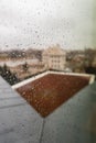 Window full of small dots of rain at cloudy day Royalty Free Stock Photo