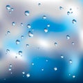 Window glass covered with raindrops on blured cloudy sky background