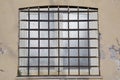 Window with grates Royalty Free Stock Photo