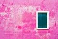 Window with green shutters on the shabby pink wall Royalty Free Stock Photo